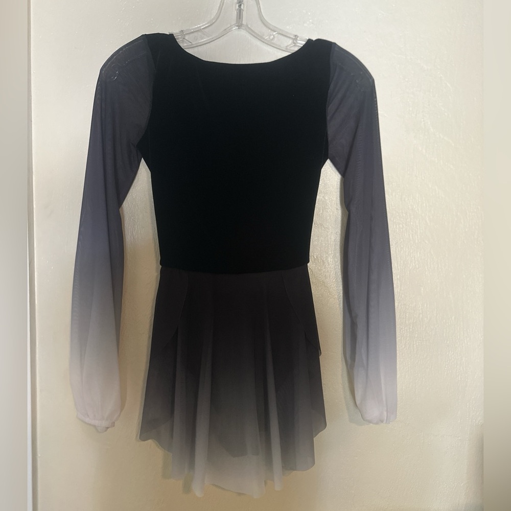 black and grey ombre ballet leotard with attached skirt with long sleeves.